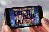 Image showing a smart phone with an online casino on the screen
